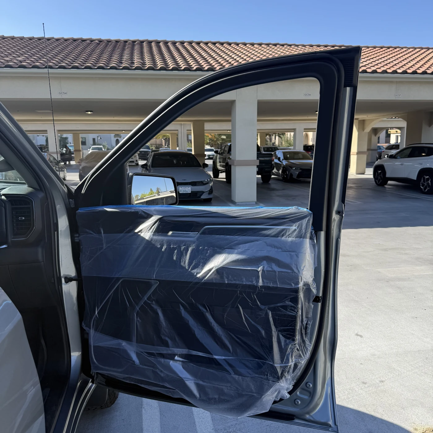 Chevrolet Silverado door panels protected before window tint installation