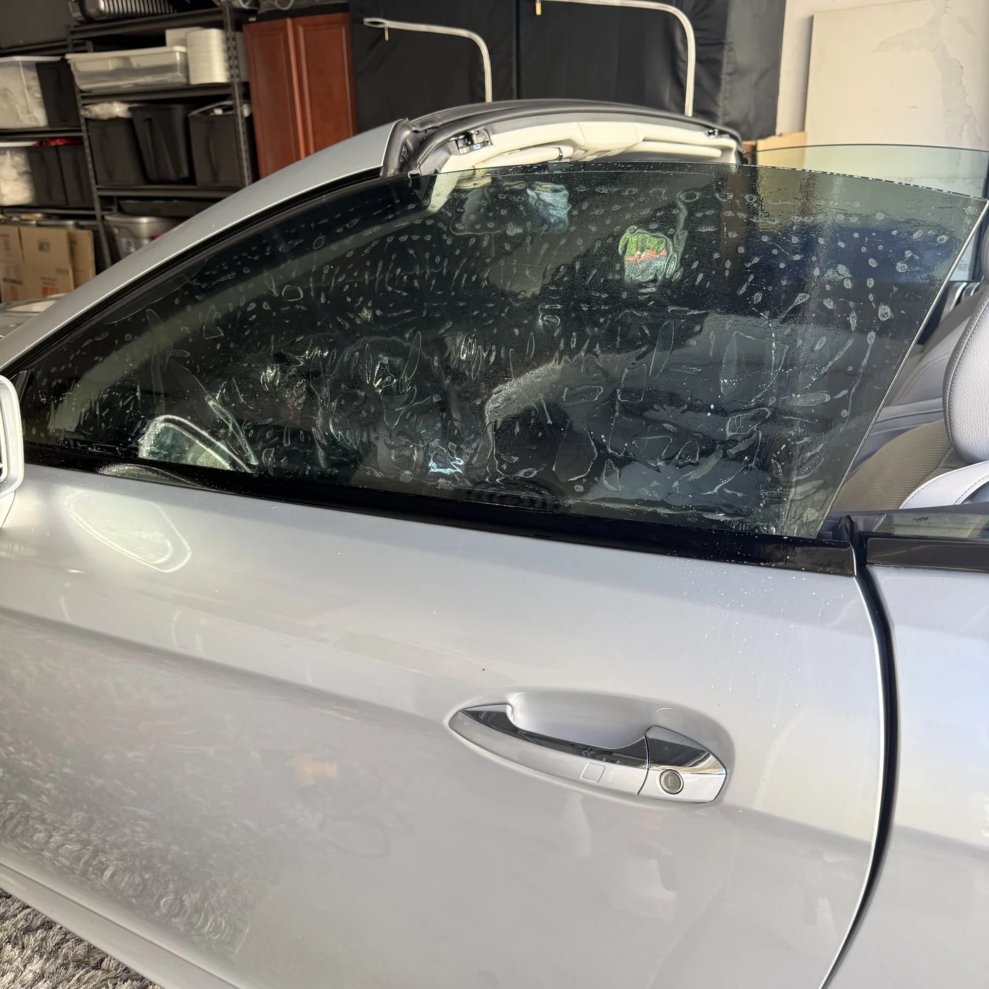 35% Nano Ceramic IR film being applied to a Mercedes-Benz SL550 side window