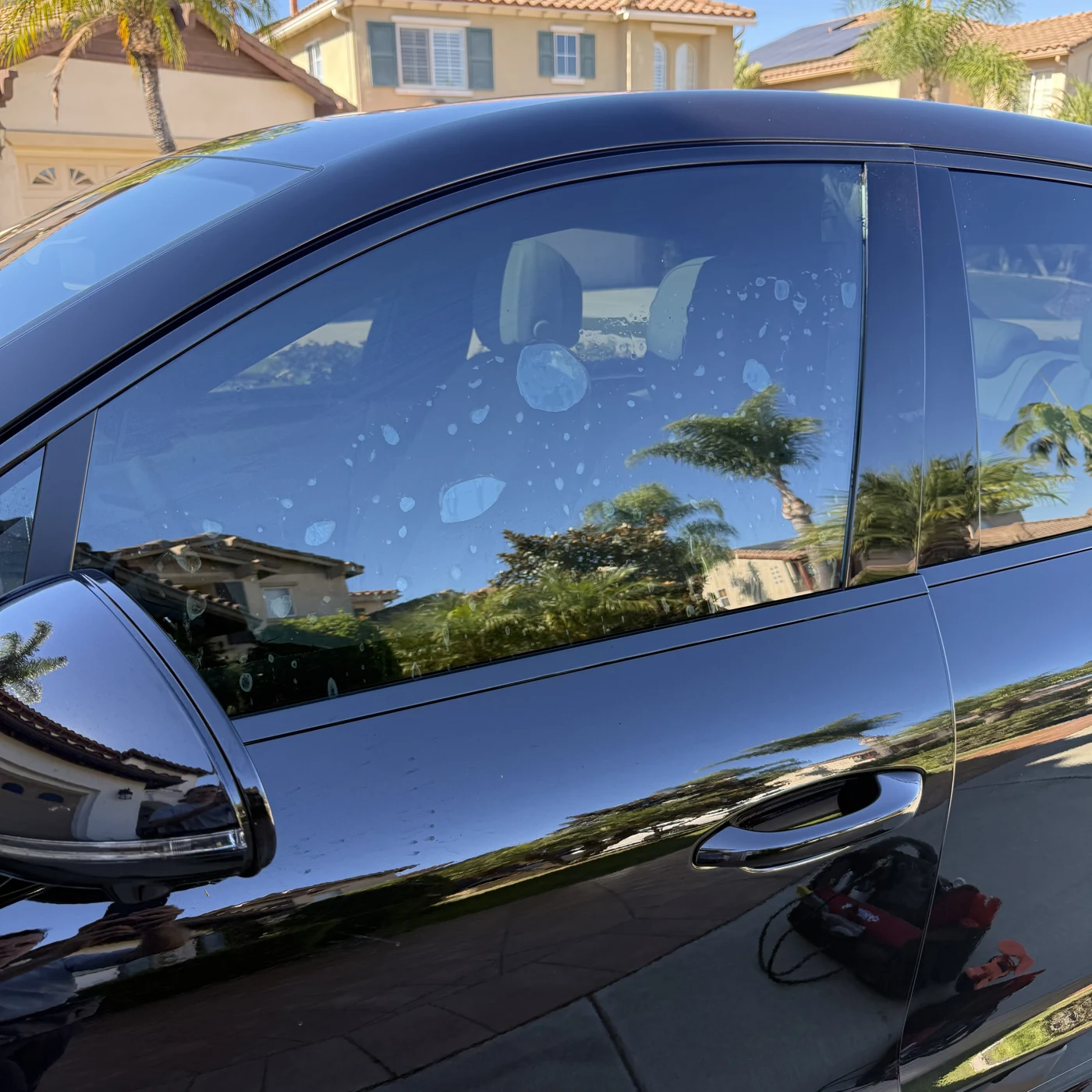 Nano Ceramic IR film being fitted to a Porsche Macan front window